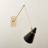 Aldus Black And Polished Brass Articulating Wall Sconce