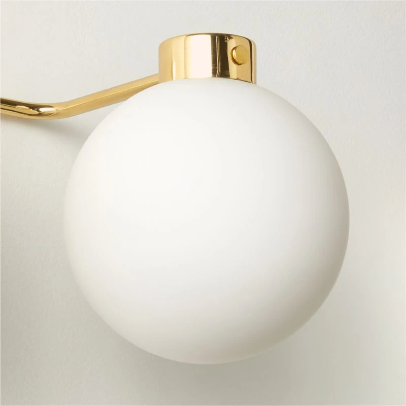 Marra 3-Bulb Polished Brass Globe Vanity Light 3 Marra 3-Bulb Polished Brass Globe Vanity Light - Image 3