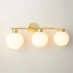 Marra 3-Bulb Polished Brass Globe Vanity Light 5 Marra 3-Bulb Polished Brass Globe Vanity Light -Cb2 Sales 2024 MarraPldBrs3BulbVntyScncROS23