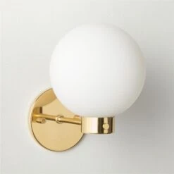 Marra Polished Brass Globe Wall Sconce Light 7 Marra Polished Brass Globe Wall Sconce Light -Cb2 Sales 2024 MarraPldBrsSngScncSHS23